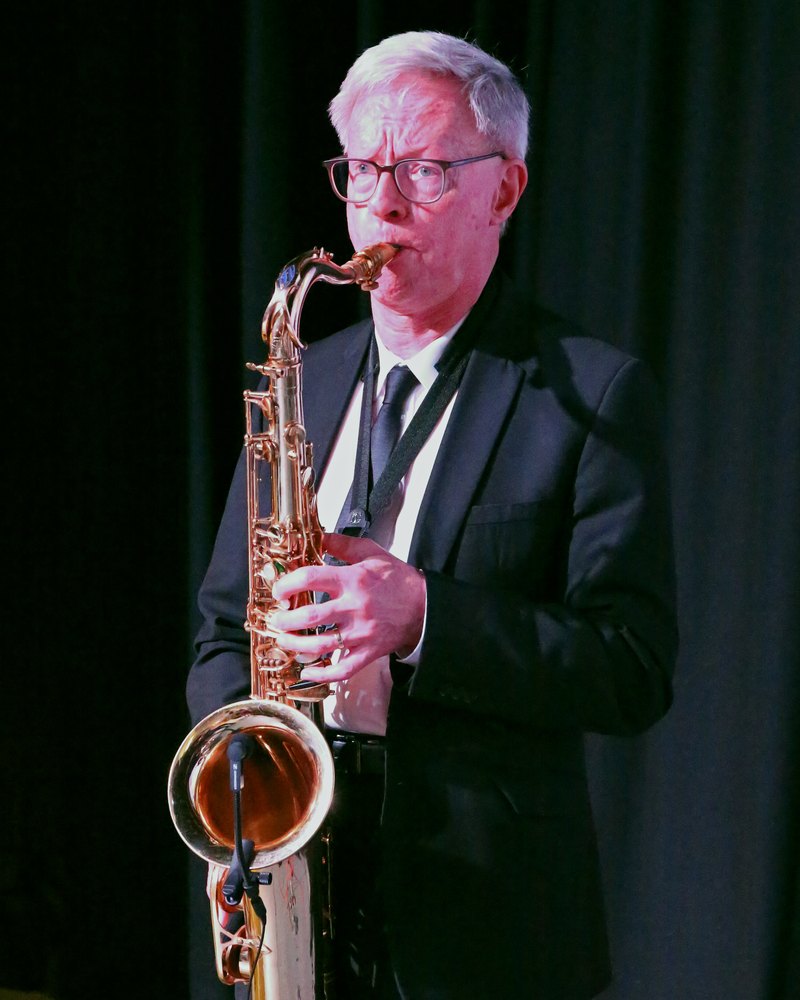 John performing on stage